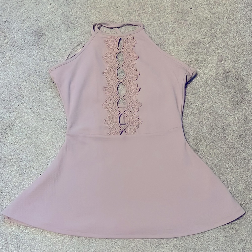 Criss cross peplum lilac tank top